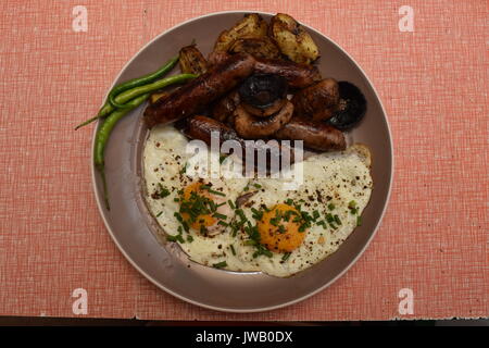 Full English breakfast served on a plate Stock Photo