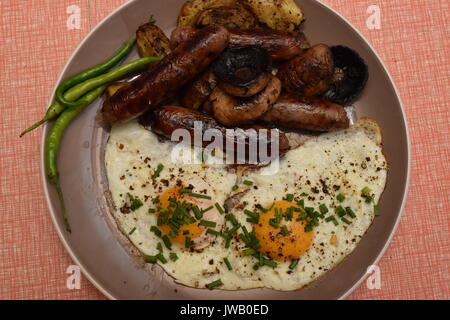 Full English breakfast served on a plate Stock Photo