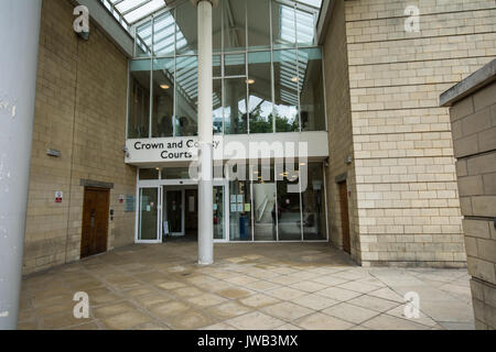 main front entrance to the Crown Court Ladys Lane Northampton Northamptonshire UK with sign and glass doors front door glass entrance pillar criminal Stock Photo