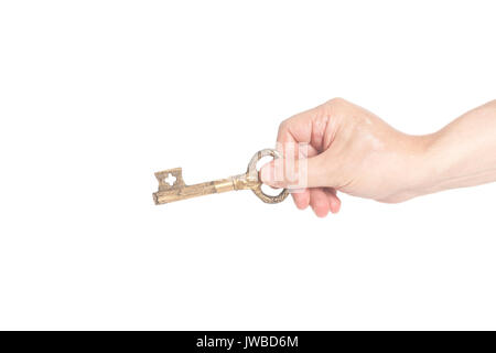 man's hand with antique golden key. collage Stock Photo - Alamy