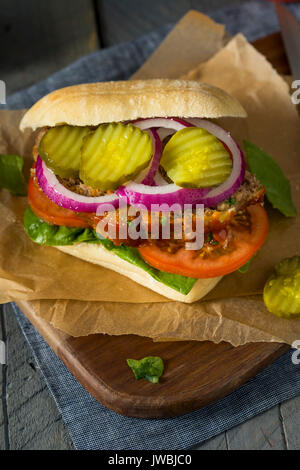Homemade Savory Meatloaf Sandwich with Lettuce and Tomato Stock Photo