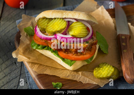 Homemade Savory Meatloaf Sandwich with Lettuce and Tomato Stock Photo