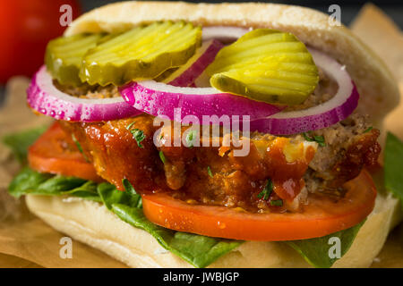 Homemade Savory Meatloaf Sandwich with Lettuce and Tomato Stock Photo