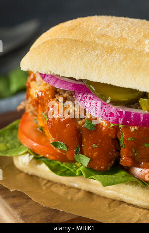 Homemade Savory Meatloaf Sandwich with Lettuce and Tomato Stock Photo