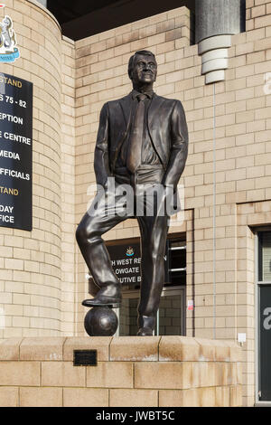 A statue of Sir Bobby Robson outside St James' Park in England celebrating his contribution to Newcastle United Football Club. Stock Photo