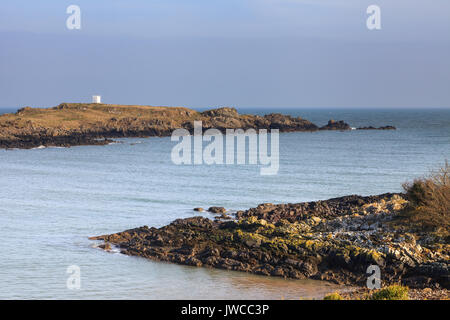 The view across Isle of Whithorn Bay in Dumfries and Galloway, Southern Scotland. In the background can be seen the Isle of Whithorn Tower. Stock Photo