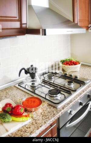 close up shot of oven and stove in domestic kitchen Stock Photo