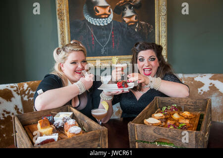 Kyloe launches National Afternoon Tea Week with Gilded Balloon act, 'Mothers Ruin: A Cabaret About Gin’, savouring Kyloe's take on the traditional. Stock Photo