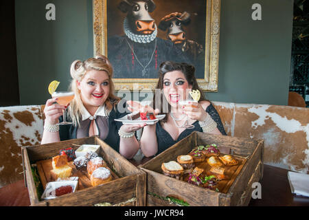 Kyloe launches National Afternoon Tea Week with Gilded Balloon act, 'Mothers Ruin: A Cabaret About Gin’, savouring Kyloe's take on the traditional. Stock Photo