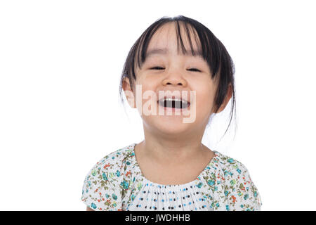 Portrait of happy Asian chinese little girl in isolated white background Stock Photo