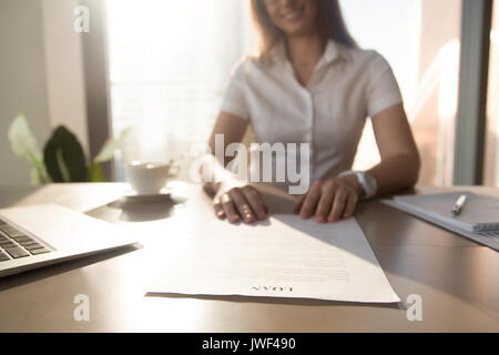 Bank worker offering loan agreement, focus on document, close up Stock Photo