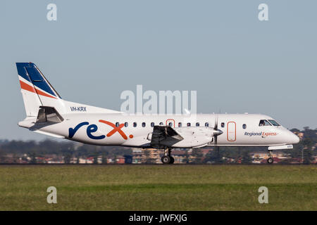 REX (Regional Express Airlines) Saab 340 twin engined regional commuter aircraft at Sydney Airport. Stock Photo