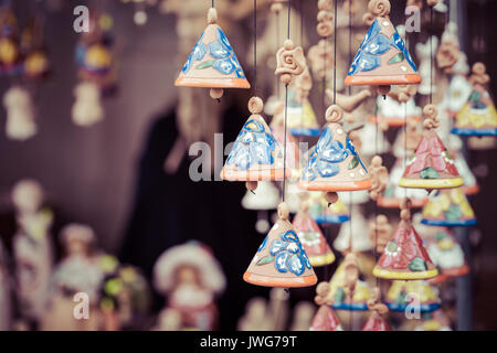 Ceramic bells as a souvenir in local traditional market. Stock Photo