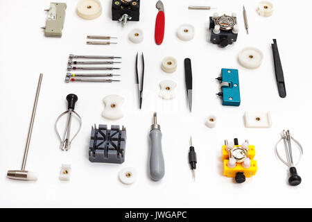 watchmaker workshop - ornament from equipment for repairing watch on white background Stock Photo