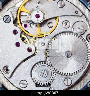 watchmaker workshop - steel clockwork of old mechanical watch Stock Photo