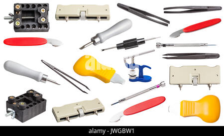 watchmaker workshop - collection of various tools for repairing watches isolated on white background Stock Photo