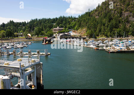 A Marina With Private Yachts ,Cabin Cruisers and Luxury Boats at Horseshoe Bay near BC Ferries Ferry Terminal in British Columbia Canada Stock Photo
