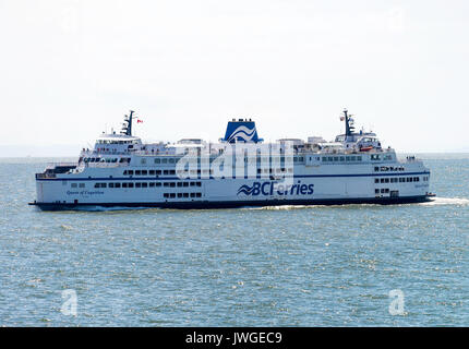 The BC Ferries Car Ferry MV Queen of Coquitlam Voyaging off Vancouver on Passage from Nanaimo to Horseshoe Bay British Columbia Canada Stock Photo