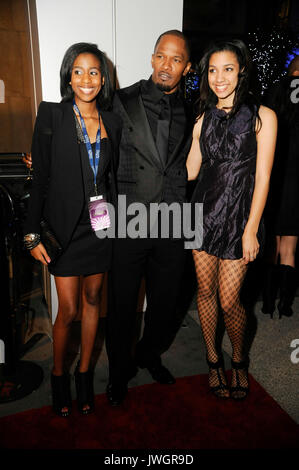 LOS ANGELES, USA.: Corinne Foxx & Jamie Foxx at the premiere of "47