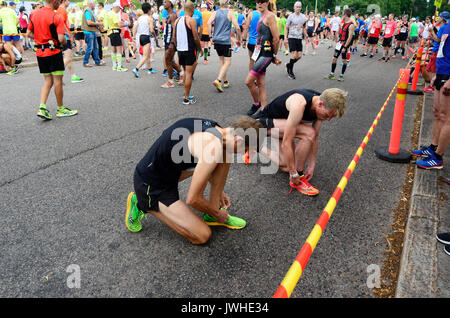 HELSINKI, FINLAND – AUGUST 12, 2017: Helsinki City Marathon, 12.08.2017. Traditional marathon held in Helsinki, Finland, on Saturday August 12. Runners from 73 countries took part in the Marathon. Race started near the monument to the legendary Finnish athlete Paavo Nurmi. Credit: Mikhail Olykaynen/Alamy Live News Stock Photo