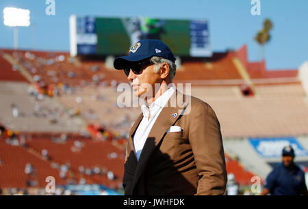 Los Angeles Rams owner Stan Kroenke holds up the Lombardi Trophy while  celebrating victory over the Cincinnati Bengals in Super Bowl 56, Sunday,  Feb. 13, 2022 in Inglewood, Calif. (AP Photo/Doug Benc