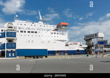 HARBOR CALAIS, FRANCE - JUNE 07, 2017: Ferry to England moored for embarking or disembarking at harbor gate in Calais, France Stock Photo