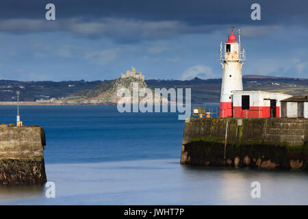 Newlyn Harbour with St Michael's Mount in the distance. Stock Photo