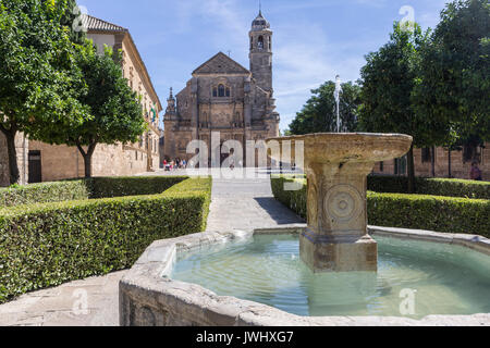 The Sacred Chapel of El Salvador (Capilla del Salvador) in the Plaza de Vazquez de Molina with the Parador hotel to the left, Ubeda,Spain Stock Photo