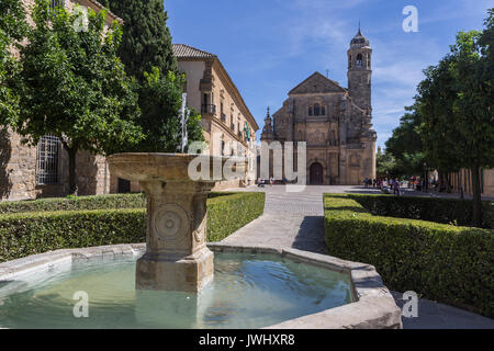 The Sacred Chapel of El Salvador (Capilla del Salvador) in the Plaza de Vazquez de Molina with the Parador hotel to the left, Ubeda,Spain Stock Photo