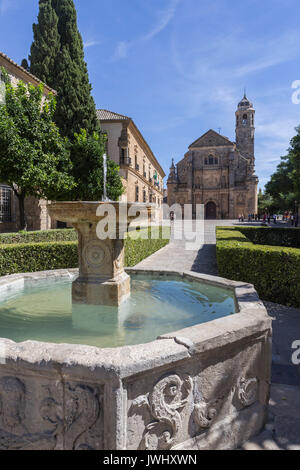 The Sacred Chapel of El Salvador (Capilla del Salvador) in the Plaza de Vazquez de Molina with the Parador hotel to the left, Ubeda,Spain Stock Photo