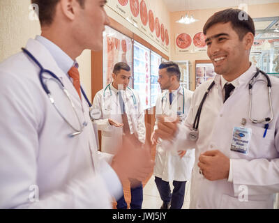 Students of Vitebsk state medical University of friendship of peoples are studying in the classroom. They are laughing, talking among themselves,posin Stock Photo