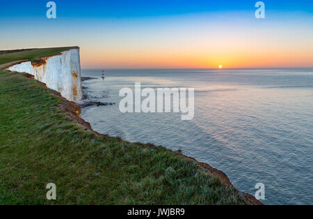 Beachy Head Light House and Chalk Cliffs at Sunrise, Sussex, England, UK Stock Photo