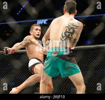 Brandon Moreno takes Sergio Pettis during UFC Fight Night 114 Mexico City,Mexico Stock Photo