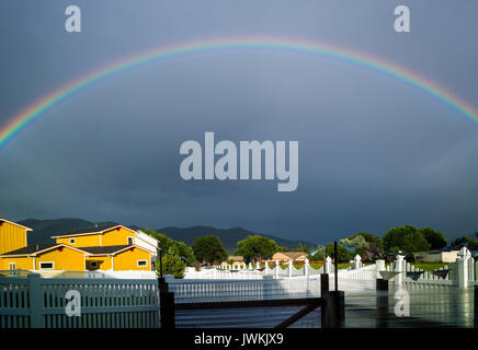 Rainbow over the small mountain town of Salida, Colorado, USA Stock Photo