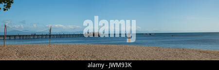A Panorama of the Beach on Green Island, a popular tourist attraction know for it's snorkeling near the Great Barrier Reef. Stock Photo