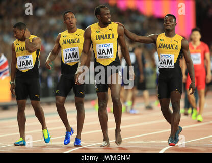 Jamaica's 4x100m Relay Team, Julian Forte, Yohan Blake, Usain Bolt and Omar McLeod react after Bolt falls during day nine of the 2017 IAAF World Championships at the London Stadium. Stock Photo