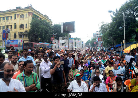 Kolkata, India. 12th Aug, 2017. Activist of Bharatiya Janata Party from various parts gather at the protest rally in Kolkata. West Bengal Bharatiya Janata Party holds a demonstration against state government at Hazra crossing on August 12, 2017 in Kolkata. Credit: Saikat Paul/Pacific Press/Alamy Live News Stock Photo