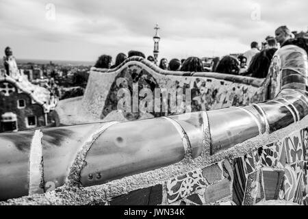 The amazing mosaic benches at Park Guell in Barcelona - BARCELONA / SPAIN - OCTOBER 2, 2016 Stock Photo