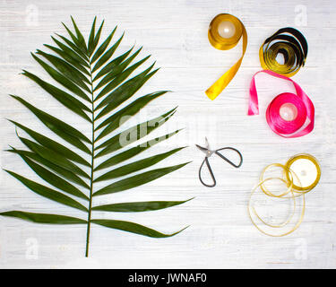 The florist desktop with working tools on wooden background Stock Photo