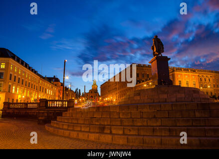 Scenic summer night view of statue and royal palace. Stockholm, Sweden. Stock Photo