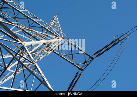 High voltage power lines carrying renewable energy from a wind turbine ...