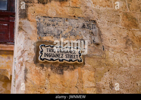 MDINA, MALTA - OCTOBER 15, 2016: Traditional street sign in the old town that was founded as Maleth in around the 8th century BC by Phoenician settlers on the island of Malta. Stock Photo