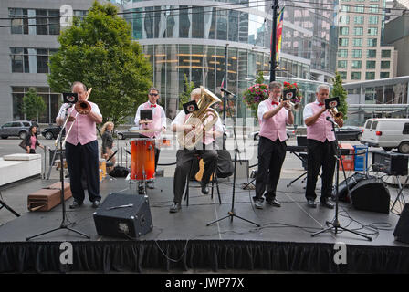 Group of musicians playing in downtown Vancouver, Britisn Columbia, Canada Stock Photo