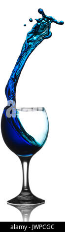 Blue Liquid Splashing Out of Wine Glass Stock Photo