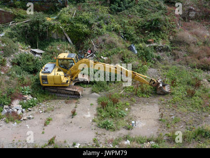 Elevated view of Komatsu pc 130 hydraulic excavator on the site of the Llandudno pier pavillion in conwy north wales uk Stock Photo
