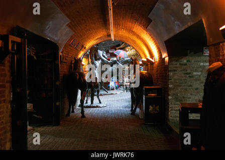 London England, Camden Market, Bronze Horse Statue, Underpass, Brick Walls, Tunnel, Camden Town, Camden Stables, Camden Spotlight, Cobble's, Bricks Stock Photo