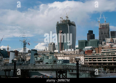 London England, River Thames, Bridge to the Royal Navy Battleship, Cranes, Financial District, Economic, Business, Frenchurch Street, Commercial Stock Photo