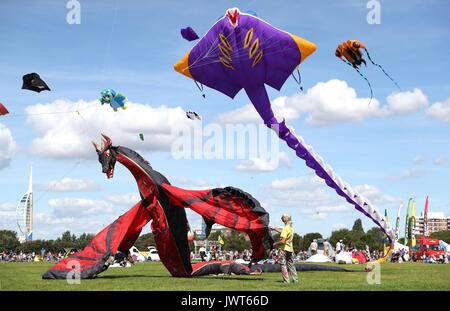 Kites are flown over Southsea Common during the 2017 Portsmouth Kite Festival in Southsea, Hampshire. Stock Photo