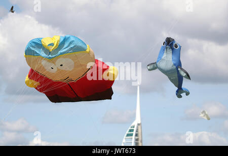 Kites are flown over Southsea Common during the 2017 Portsmouth Kite Festival in Southsea, Hampshire. Stock Photo