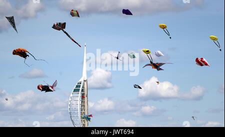 Kites are flown over Southsea Common during the 2017 Portsmouth Kite Festival in Southsea, Hampshire. Stock Photo